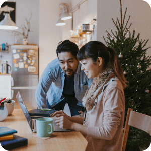 Couple looking at a computer.